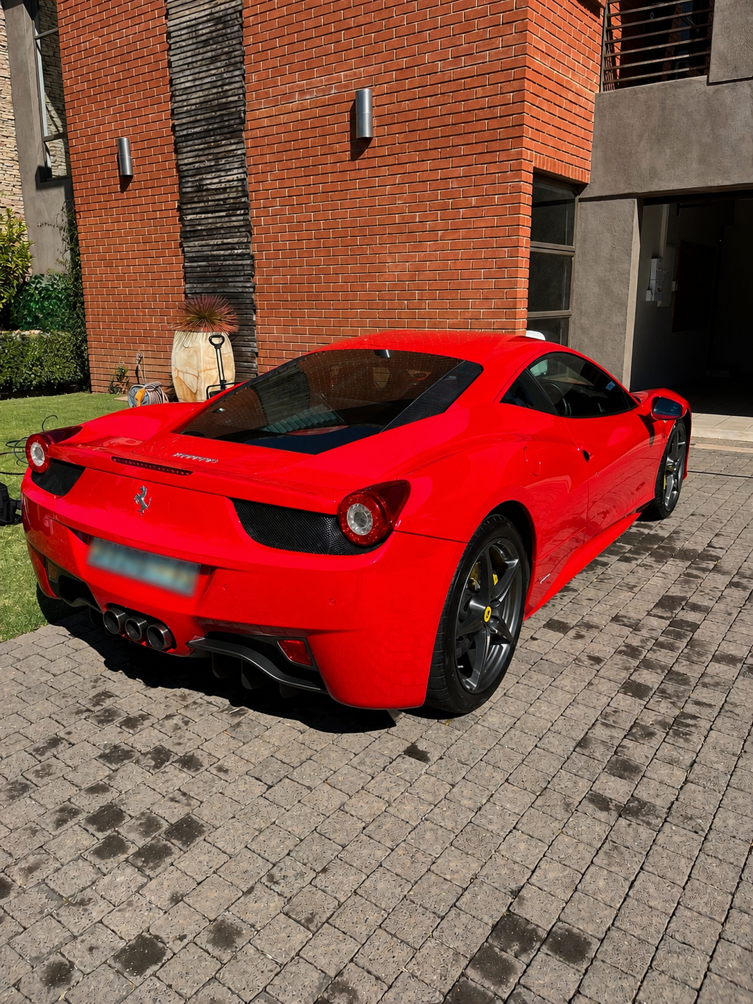 Rear of a detailed red Ferrari 458 Italia