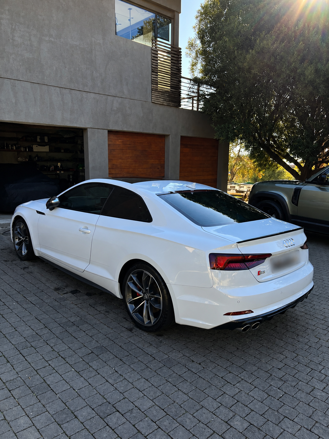 Audi S5 rear three-quarter after a full detail