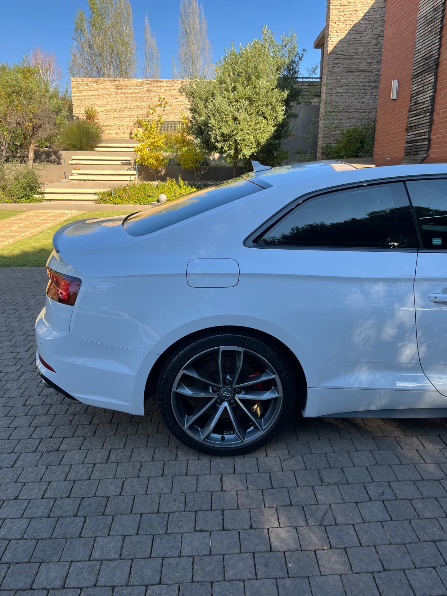 Cleaned Audi S5 wheel and tyre with dressed sidewall